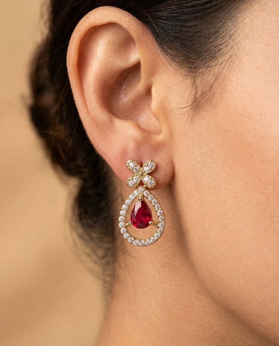 Close-up of earring worn on a model's ear